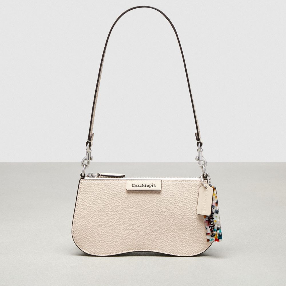 Coach Wavy Baguette Bag In Pebbled Coachtopia Leather Beige | COH864826